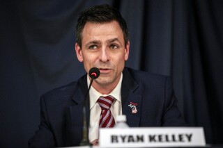 FILE - Ryan Kelley, a Republican candidate for Michigan governor, speaks during a rally outside the Michigan Capitol in Lansing, Mich., Feb. 8, 2022. Kelley, a former Republican candidate for governor of Michigan who pleaded guilty to a misdemeanor offense in the Jan. 6, 2021, U.S. Capitol riot, is set to be sentenced today. (Jake May/The Flint Journal via AP, File)