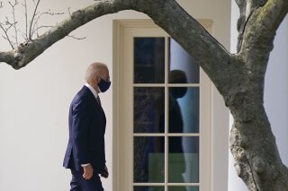 President Joe Biden walks to the Oval Office of the White House, Tuesday, March 9, 2021, in Washington. Biden is returning to the White House after visiting W.S. Jenks & Son hardware store, a small business that received a Paycheck Protection Program loan. (AP Photo/Patrick Semansky)