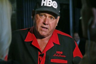 
              FILE - In this June 13, 2016, file photo, Dennis Hof, owner of the Moonlite BunnyRanch, a legal brothel near Carson City, Nevada, is pictured during an interview in Oklahoma City. Hof, who died last month after fashioning himself as a Donald Trump-style Republican candidate has won a heavily GOP state legislative district. Hof defeated Democratic educator Lesia Romanov on Tuesday, Nov. 8, 2018 in the race for Nevada's 36th Assembly District. (AP Photo/Sue Ogrocki, File)
            