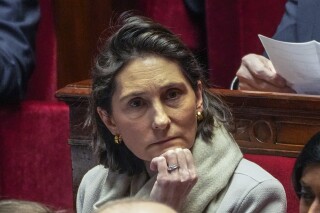 FILE - French Minister of Education, Sports, and Olympic Games Amelie Oudea-Castera attends the first session of questions to the new government at the National Assembly in Paris, Tuesday, Jan. 16, 2024. Nearly 400 French coaches, teachers and other sports officials were suspected of sexual abuse or covering it up in 2023, the country's Minister of Sports, Olympics and Paralympics Games Amelie Oudea-Castera said on Thursday, March 21, 2024. (AP Photo/Michel Euler, File)