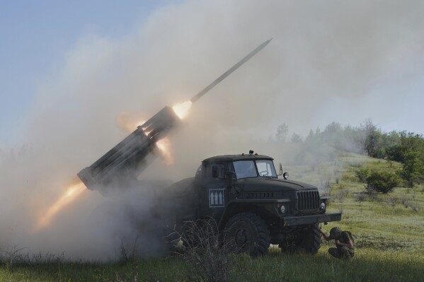 Soldiers of Ukraine's 30th Separate Mechanized Brigade fire a Grad multiple rocket launcher towards Russian positions at the frontline in Donetsk region, Ukraine, Tuesday, June 3, 2025. (AP Photo/Andrii Marienko)