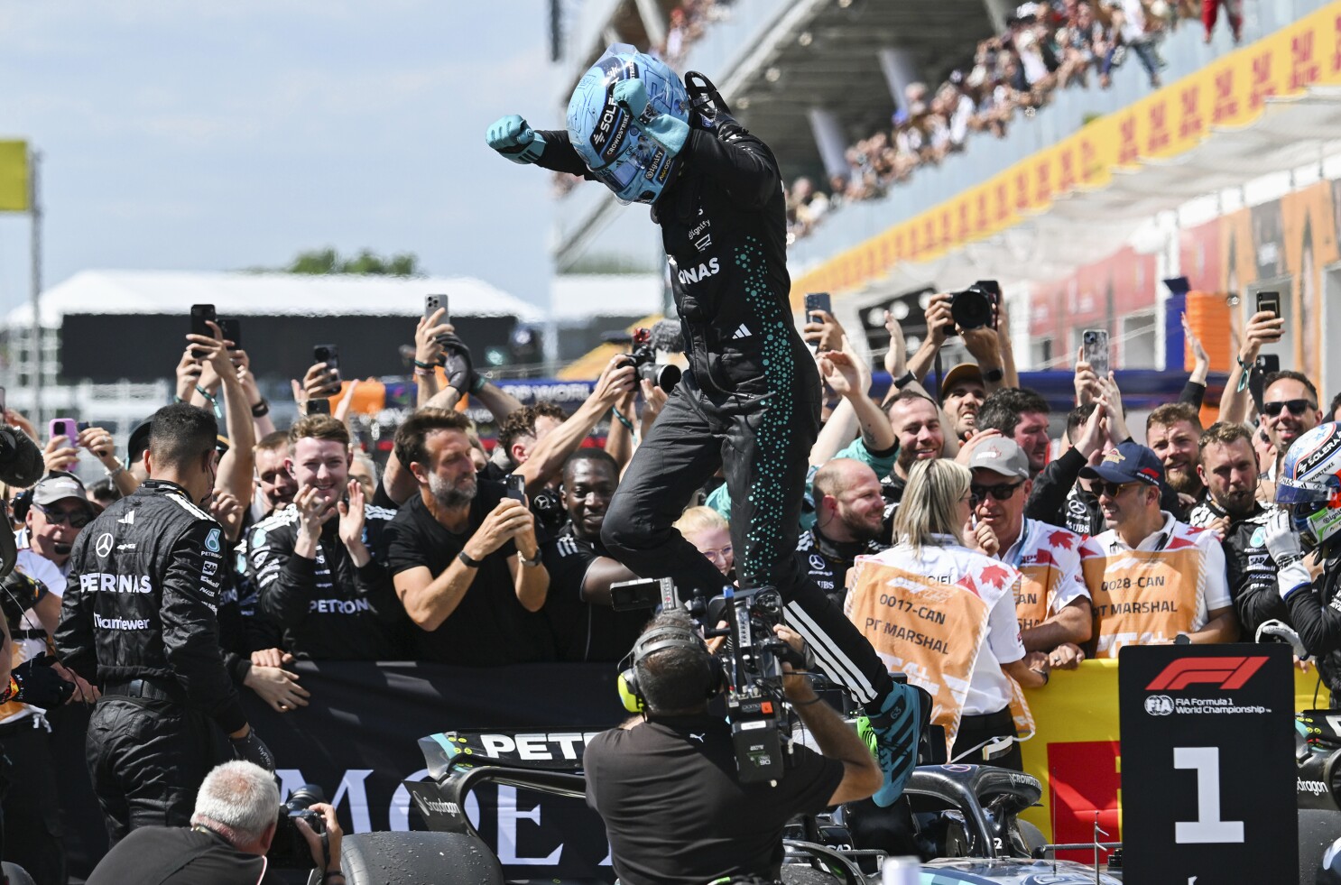 George Russell holds off Max Verstappen for Canadian GP win as McLarens collide