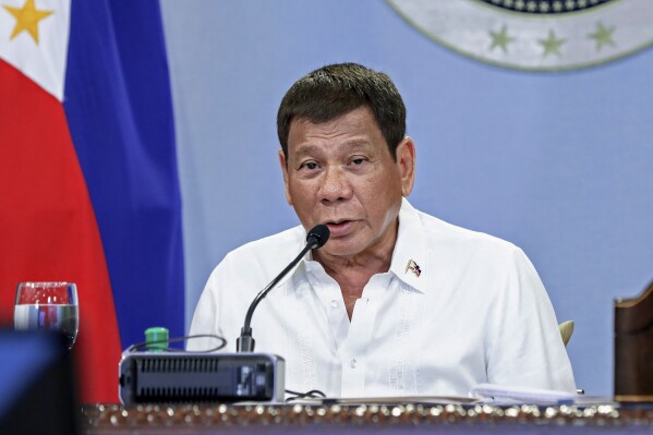 FILE. In this file photo released by the Malacanang Presidential Photographers Division, Philippine President Rodrigo Duterte talks with members of the Inter-Agency Task Force on the Emerging Infectious Diseases at the Malacanang Presidential Palace in Manila, Philippines, on May 31, 2021. Appeals judges at the International Criminal Court ruled Tuesday, July 18, 2023, that an investigation into the Philippines so-called “war on drugs” can resume, rejecting Manila’s objections to the case going ahead at the global court. (Richard Madelo/ Malacanang Presidential Photographers Division via AP, File)