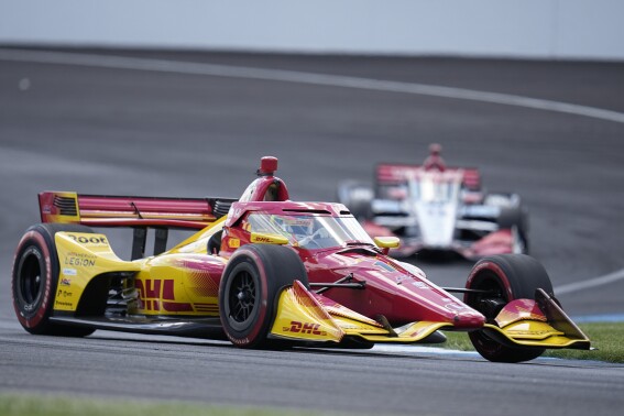 Alex Palou, of Spain, drives during the IndyCar Grand Prix auto race at Indianapolis Motor Speedway, Saturday, May 11, 2024, in Indianapolis. (AP Photo/Darron Cummings)