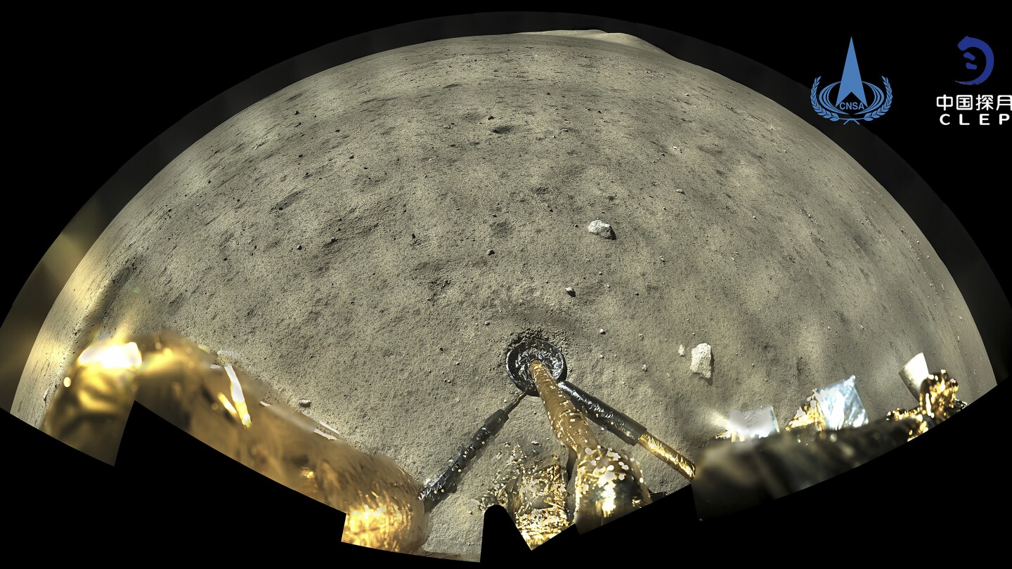 FILE - This Dec. 2, 2020, file image taken by panoramic camera aboard the lander-ascender combination of Chang’e-5 spacecraft provided by China Nati