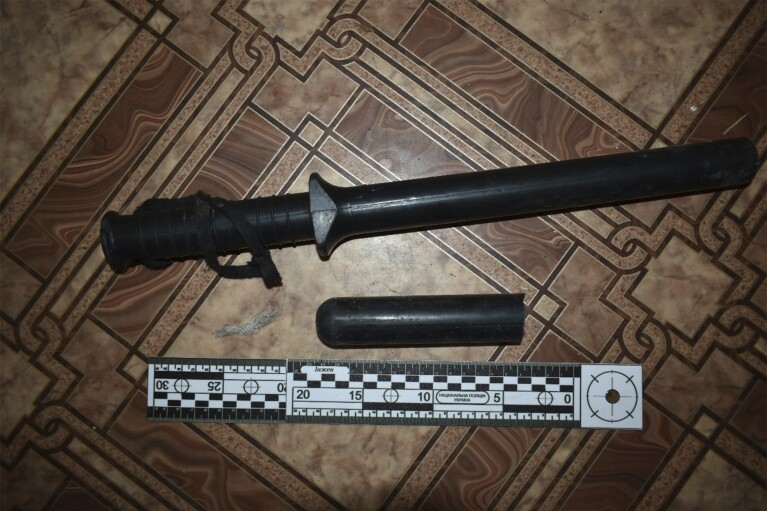 This photo provided by Ukrainian investigators in 2023 shows a baton found a building used by Russian forces in Izium, Ukraine. Civilians who had been detained by Russian soldiers described being tortured with instruments like this. (AP Photo)