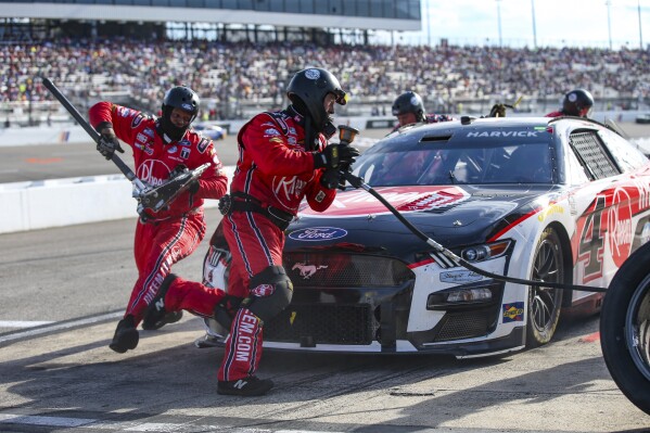 Kevin Harvick makes a green-flag pitstop in the last stage of a NASCAR Cup Series auto race, Sunday, July 30, 2023, in Richmond, Va. (AP Photo/Skip Rowland)