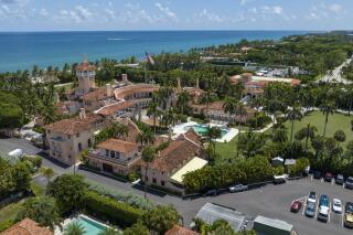 FILE - Former President Donald Trump's Mar-a-Lago club is seen in the aerial view in Palm Beach, Fla., Aug. 31, 2022. As a businessman and president, Donald Trump faced a litany of lawsuits and criminal investigations yet emerged from the legal scrutiny time and again with his public and political standing largely intact. But he’s perhaps never confronted a probe as perilous as the Mar-a-Lago investigation, an inquiry focused on the potential mishandling of top-secret documents. (AP Photo/Steve Helber, File)