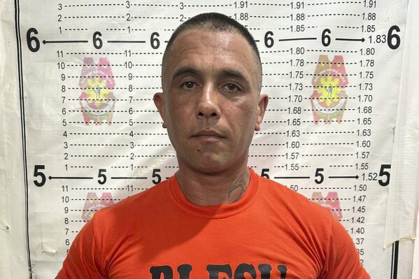In this handout photo provided by the Philippine Bureau of Immigration, Australian national Gregor Johann Haas poses for a mugshot following his arrest in Cebu province, Central Philippines on Wednesday, May 15, 2024. One of Indonesia's most-wanted drug suspects has been arrested in the Philippines after an international manhunt and efforts were underway to have the suspect, reportedly the father of an Australian rugby star, extradited to Jakarta to face charges, Indonesian and Philippine officials said Friday. (Philippine Bureau of Immigration via AP)
