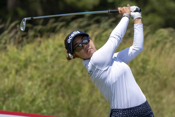 Jenny Shin, of South Korea, tees off on the 11th hole during the first round of the ShopRite LPGA Classic golf tournament, Friday, June 7, 2024, in Galloway, N.J.. (AP Photo/Chris Szagola)