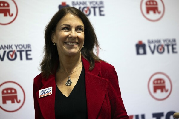 Pennsylvania Supreme Court Republican candidate Judge Carolyn Carluccio speaks at a meet and greet at County Corvette in West Chester, Pa., Monday, Oct. 30, 2023. (AP Photo/Ryan Collerd)