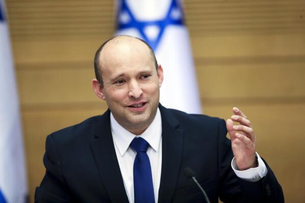 FILE - In this June 13, 2021, file photo Israel's new prime minister Naftali Bennett holds a first cabinet meeting in Jerusalem. How President Joe Biden and Prime Minister Naftali Bennett manage that relationship will shape the prospects for peace and stability in the Middle East. They are ushering in an era no longer shaped by the powerful personality of Prime Minister Benjamin Netayahu, who repeatedly defied the Obama administration, and then reaped the rewards of a warm relationship with President Donald Trump. (AP Photo/Ariel Schalit, File)
