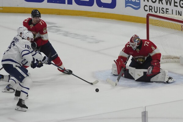 Florida Panthers goaltender Sergei Bobrovsky (72) deflects a shot ny Toronto Maple Leafs center Steven Lorentz (18) during the third period in Game 3 of a second-round NHL hockey playoff series, Friday, May 9, 2025, in Sunrise, Fla. (AP Photo/Marta Lavandier)