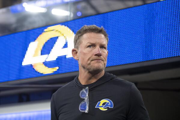 FILE - Los Angeles Rams general manager Les Snead walks on the field before an NFL football game against the Tennessee Titans, Nov. 7, 2021, in Inglewood, Calif. Les Snead says the Los Angeles Rams need to replenish their organizational depth, and he is looking forward to doing it by making a bunch of draft picks in the next few years. (AP Photo/Kyusung Gong, File)