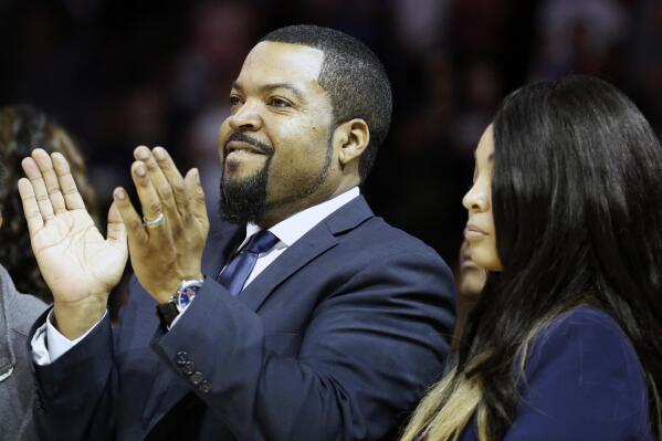 FILE - In this June 25, 2017, file photo, Big3 Basketball League founder Ice Cube applauds the crowd during a timeout in the first half of Game 2 in the league's debut at the Barclays Center in New York. Ice Cube is still looking to take his 3-on-3 basketball league to greater heights in its fourth season of play. The Big3 took the summer of 2020 off because of the pandemic. (AP Photo/Kathy Willens, File)