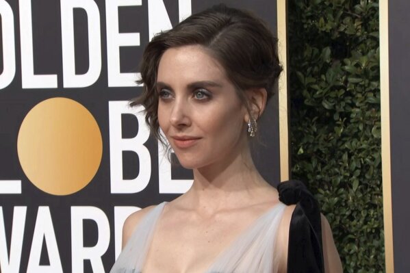 
              This image taken from video shows actress Alison Brie arriving at the 76th annual Golden Globe Awards at the Beverly Hilton Hotel on Sunday, Jan. 6, 2019, in Beverly Hills, Calif.  (AP Photo/Jeff Turner)
            