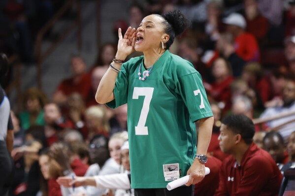 South Carolina head coach Dawn Staley directs her team against Kentucky during the second half of an NCAA college basketball game in Columbia, S.C., Monday, Jan. 15, 2024. (AP Photo/Nell Redmond)