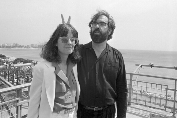 FILE - Film director Francis Ford Coppola appears with his wife Ellie at the Cannes Film Festival on May 19, 1979. Coppola is back at Cannes with his latest film "Megalopolis." (Ǻ Photo, File)
