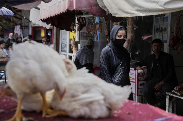 A woman walks to a market in Kabul, Afghanistan on Thursday, June 5th, 2025.