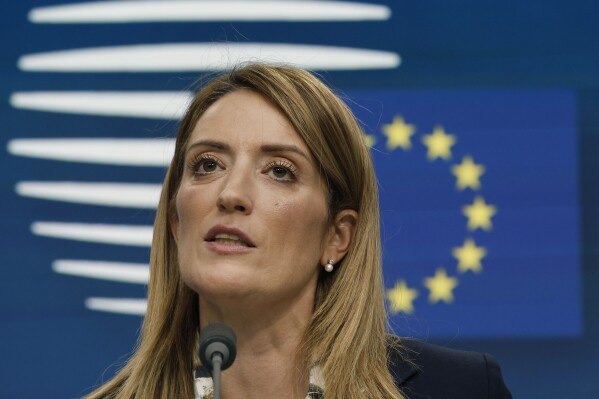 FILE - European Parliament President Roberta Metsola speaks during a media conference at an EU summit in Brussels, Thursday, Dec. 14, 2023. Media reports in Latvia say that the country's state security service has started criminal proceedings against an European Parliament lawmaker and a citizen of the Baltic country who is suspected of cooperating with Russian intelligence and security services. Latvian media outlets reported Saturday, March 16, 2024 that Latvian security service has been investigating the activities of 73-year-old Tatjana Ždanoka and her alleged Russia ties over the past several weeks. (AP Photo/Omar Havana, file)