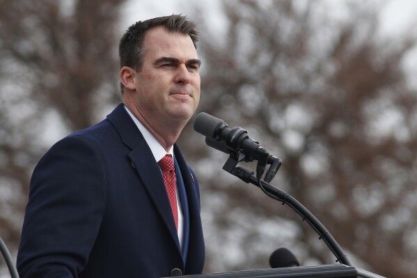 FILE - Oklahoma Governor Kevin Stitt gives his inaugural speech during ceremonies in Oklahoma City, Monday, Jan. 14, 2019. (AP Photo/Sue Ogrocki, file)