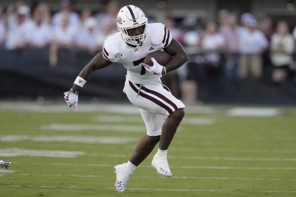 Mississippi State running back Jo'Quavious Marks runs for a first down against Arizona during the first half of an NCAA college football game Saturday, Sept. 9, 2023, in Starkville, Miss. (AP Photo/Rogelio V. Solis)
