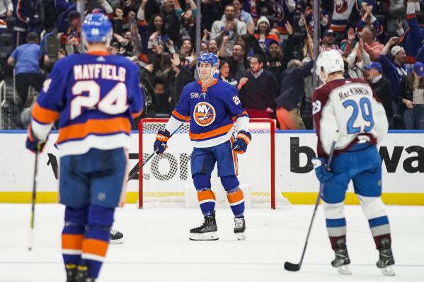 New York Islanders centerman Brock Nelson (29) celebrates after his goal against the Colorado Avalanche during the third period of an NHL hockey game, Saturday, Oct. 29, 2022, in Elmont, N.Y. (AP Photo/Eduardo Munoz Alvarez)