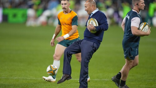 Australian coach Eddie Jones kicks the ball as he warms -up his players ahead of the Rugby Championship test match between Australia and Argentina in Sydney, Australia, Saturday, July 15, 2023. (AP Photo/Rick Rycroft)
