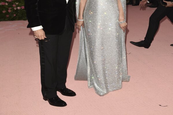 
              Tom Ford, left, and Gemma Chan attend The Metropolitan Museum of Art's Costume Institute benefit gala celebrating the opening of the "Camp: Notes on Fashion" exhibition on Monday, May 6, 2019, in New York. (Photo by Evan Agostini/Invision/AP)
            