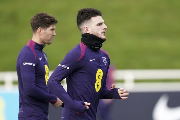 England's Declan Rice attends a training session ahead of Saturday's friendly soccer match against Brazil, at St. George's Park, Burton upon Trent, England, Friday March 22, 2024. (Mike Egerton/PA via AP)