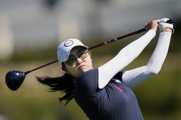 United States' Rose Zhang plays a tee shot hole number 4, during her eighteen match during her single match at the Solheim Cup golf tournament in Finca Cortesin, near Casares, southern Spain, Sunday, Sept. 24, 2023. Europe play the United States in this biannual women's golf tournament, which played alternately in Europe and the United States. (AP Photo/Bernat Armangue)
