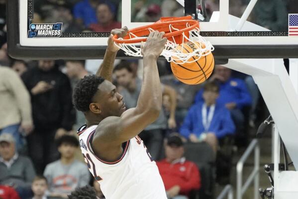Illinois' Kofi Cockburn dunks against Chattanooga during the first half of a college basketball game in the first round of the NCAA tournament, Friday, March 18, 2022, in Pittsburgh. (AP Photo/Keith Srakocic)
