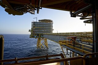 FILE - In this Oct. 23, 2013, file photo of A.P. Moller-Maersk's oil rig in the North Sea named Halfdan. Denmark has decided to end to all oil and gas offshore activities in the North Sea by 2050 and has cancelled its latest licensing round, saying the country is "now putting an end to the fossil era.” The Danish Parliament voted late Thursday to end the offshore gas and oil extraction that started in 1972 and has made it the largest producer in the European Union. (Claus Bonnerup/Polfoto via AP,file)