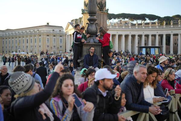 People fill St. Peter's Square ahead of the funeral of Pope Francis at the Vatican, Saturday, April 26, 2025. (AP Photo/Andreea Alexandru)