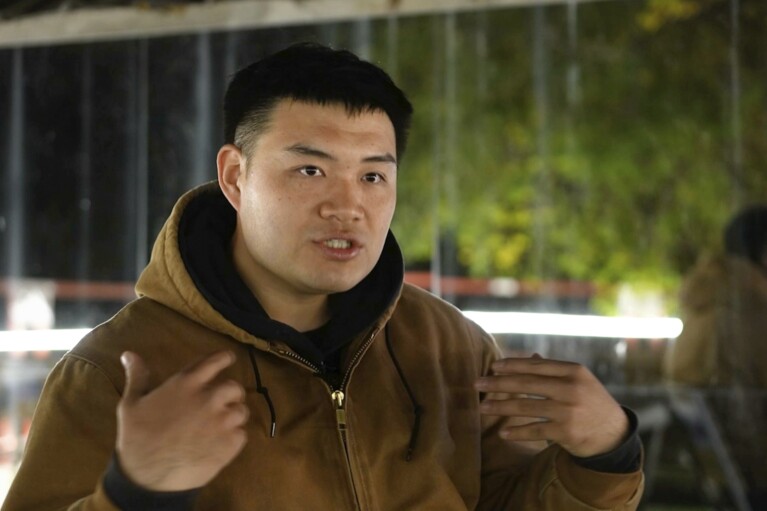 Xing Long, a DJ and rave organizer, speaks during an interview with The Associated Press in his hometown of Changchun in northeastern China's Jilin province on Oct. 12, 2024. (AP Photo/Dake Kang)