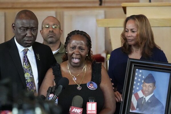 Chantemekki Fortson, mother of slain Roger Fortson, a U.S. Air Force senior airman, speaks during a news conference with attorney Ben Crump, left, on Monday, June 3, 2024, in Atlanta. (AP Photo/Brynn Anderson)