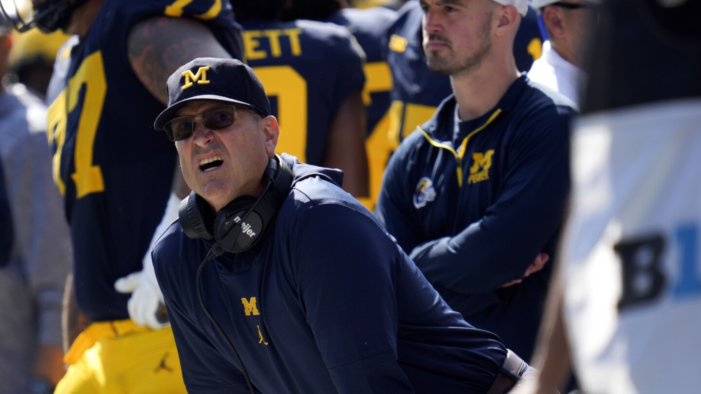 Jim Harbaugh banned for rest of Michigan football's regular-season | AP News