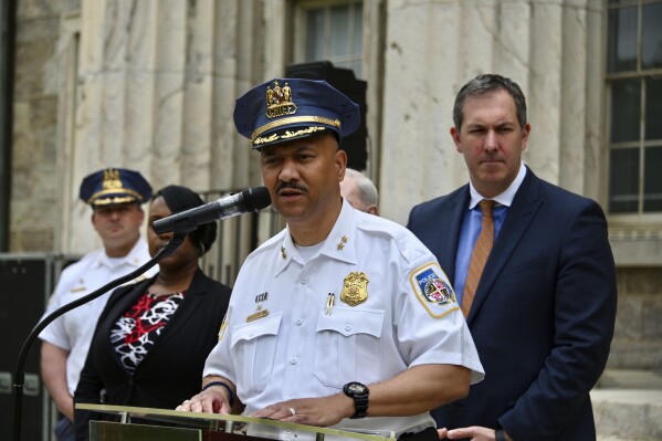 Baltimore County Police Chief Robert McCullough and other local officials speak at a news conference in Towson, Maryland, on Thursday April 25, 2024. The officials discussed the arrest of a high school athletic director on charges that he used artificial intelligence to impersonate a principal on an audio recording that included racist and antisemitic comments. (Kim Hairston/The Baltimore Sun via AP)