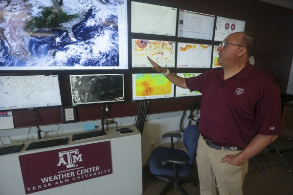 Andrew Dessler, professor of Atmospheric Science at Texas A&M University, speaks to The Associated Press about the science behind heat waves, Friday, June 7, 2024, at the university in College Station, Texas. (AP Photo/Lekan Oyekanmi)