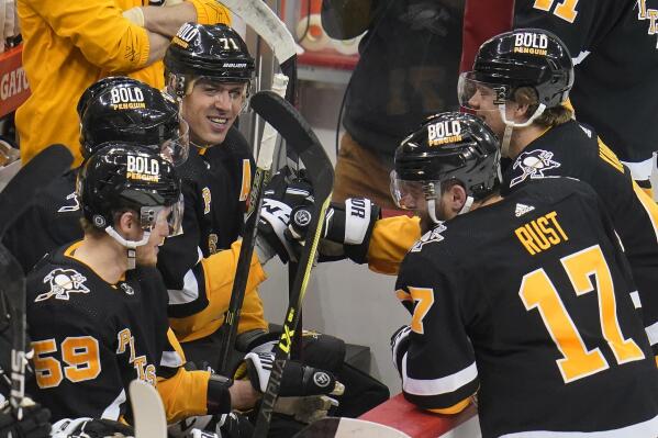 Pittsburgh Penguins' Evgeni Malkin (71) celebrates after scoring his third goal of the NHL hockey game against the Detroit Red Wings in Pittsburgh, Sunday, March 27, 2022. The Penguins won 11-2.(AP Photo/Gene J. Puskar)