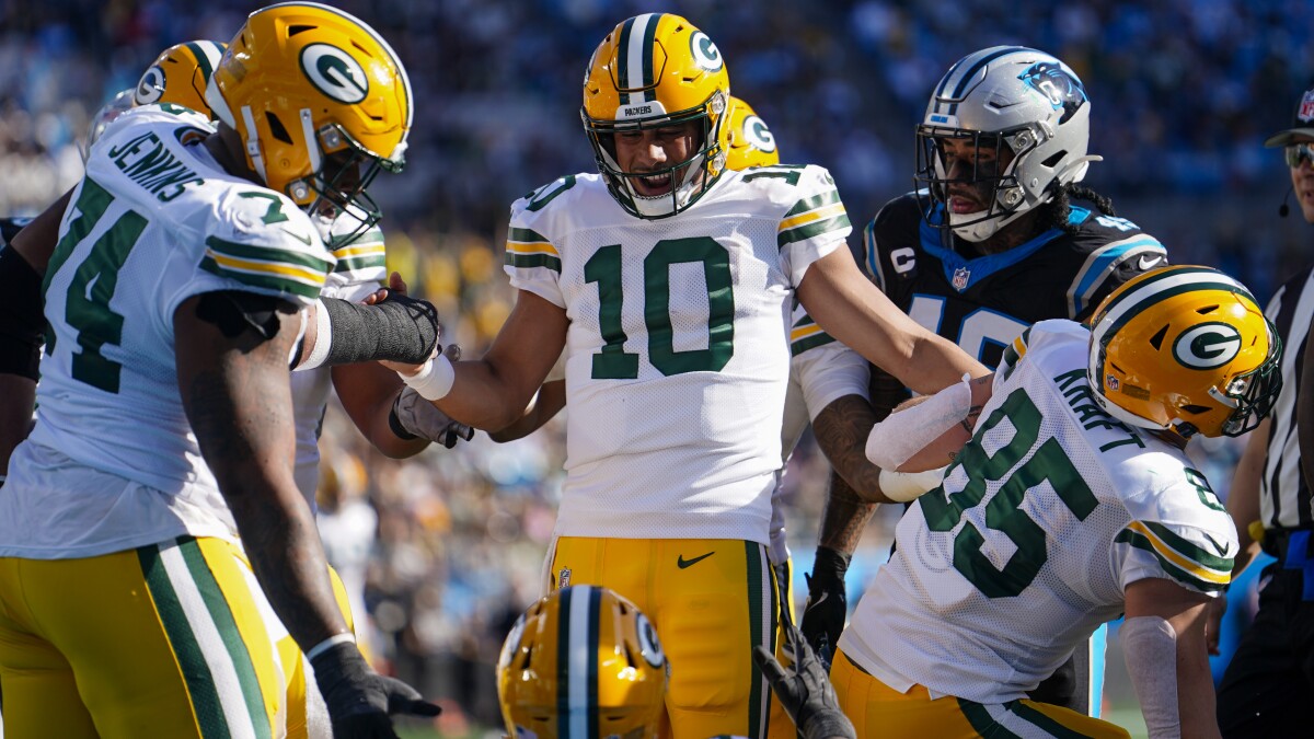 Jordan Love, Packers survive rally by Panthers, win 33-30 to keep playoff  hopes alive | AP News
