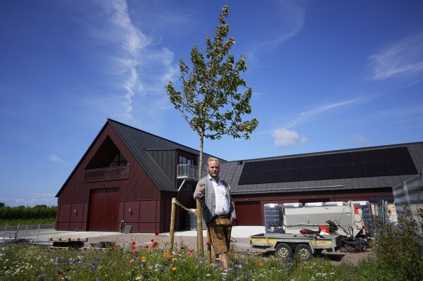 Winemaker and oenologist Felix Åhrberg poses for a picture at Kullabergs Vingård, in Nyhamnsläge, Sweden, Tuesday, July 25, 2023. (AP Photo/Pavel Golovkin)