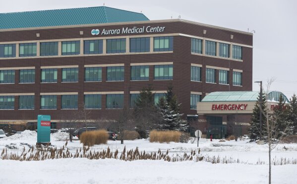 This Thursday, Dec. 31, 2020 photo shows the Aurora Medical Center in Grafton, Wis. A pharmacist at the suburban Milwaukee medical center deliberately removed hundreds of coronavirus vaccine doses from refrigeration and left them out overnight twice, not just once as officials initially believed, the health system's chief medical officer said Thursday. (Mark Hoffman/Milwaukee Journal-Sentinel via AP)