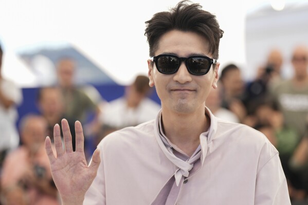 Mark Chao poses for photographers at the photo call for the film "Resurrection" at the 78th international film festival in Cannes, southern France, Friday, May 23, 2025. (AP Photo/Natacha Pisarenko)