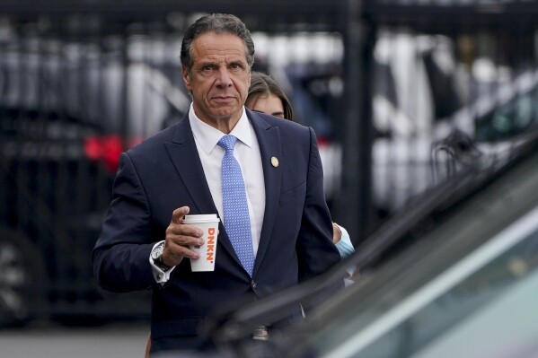 New York Gov. Andrew Cuomo prepares to board a helicopter, Aug. 10, 2021, in New York. A New York appeals court has ruled that a state commission tasked with investigating ethical violations was created unconstitutionally, a ruling that could strip the watchdog agency of its enforcement powers. The Thursday, May 9, 2024 ruling stems from a lawsuit filed by former Gov. Andrew Cuomo. (AP Photo/Seth Wenig, file)