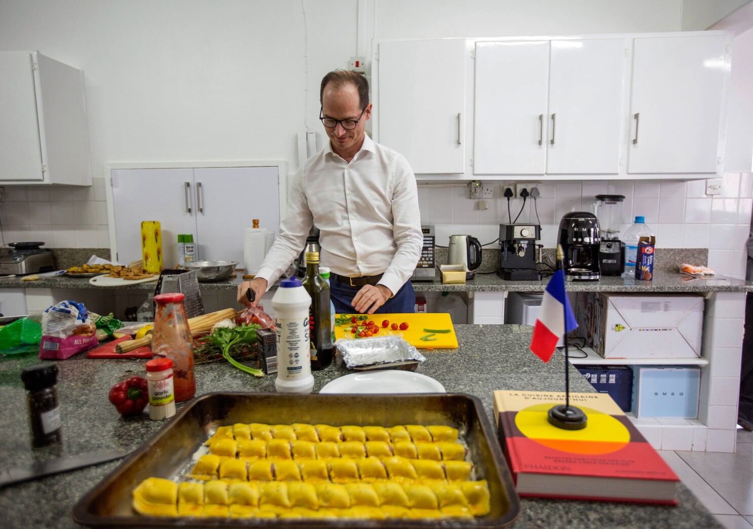 Diplomats in Zimbabwe embrace local culture in a lively cooking contest