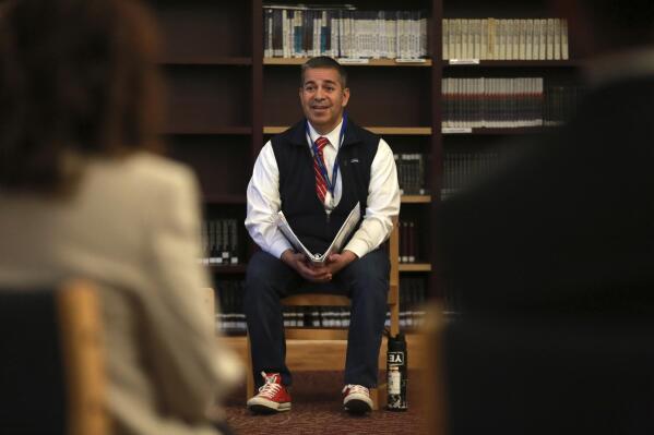 Sen. Ben Ray Luján, D-N.M., speaks to students who have suffered mental health issues during the pandemic at Santa Fe High School library on Thursday, April 21, 2022, in Santa Fe, N.M. Luján returned to Congress in March after suffering a stroke that kept him away from the Senate for weeks and temporarily halted Democrat's hold on power in the 50-50 split Senate. (AP Photo/Cedar Attanasio)
