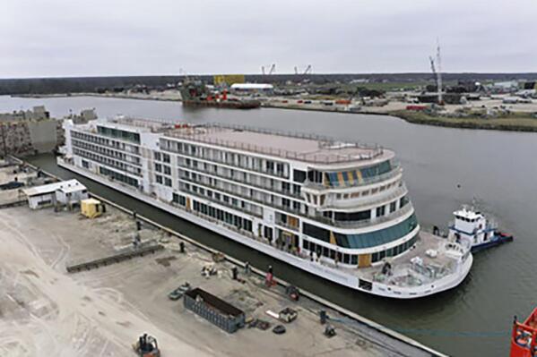 This photo provided by Viking shows the Viking Mississippi at Edison Chouest Offshore's LaShip shipyard in Houma, La., on March 7, 2022.  The Swiss company’s cruises along the length of the Mississippi River are a step closer to reality — its new 386-passenger ship has touched water for the first time. Viking River Cruises of Basel, which announced plans for Mississippi River cruises in 2015, celebrated the “float out” of the Viking Mississippi on Monday, March 7, at Edison Chouest Offshore’s LaShip shipyard in Houma. (Viking via AP)