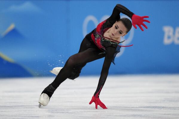 FILE - Kamila Valieva, of the Russian Olympic Committee, falls in the women's free skate program during the figure skating competition at the 2022 Winter Olympics, Thursday, Feb. 17, 2022, in Beijing. No 15-year-old figure skaters will be allowed to compete at the 2026 Olympics following the controversy surrounding Russian competitor Kamila Valieva at this year's Beijing Games. A new age limit for figure skaters at senior international events was passed Tuesday, June 7, 2022 by the International Skating Union in a 110-16 vote that will raise the minimum age to 17 before the next Winter Olympics in Milan-Cortina d’Ampezzo, Italy. (AP Photo/Bernat Armangue, File)