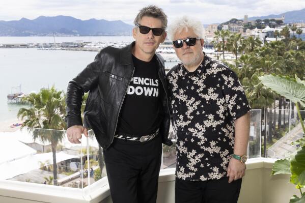 Ethan Hawke, left, and director Pedro Almodovar pose for portrait photographs for the film 'Strange Way of Life' at the 76th international film festival, Cannes, southern France, Thursday, May 18, 2023. (Photo by Joel C Ryan/Invision/AP)